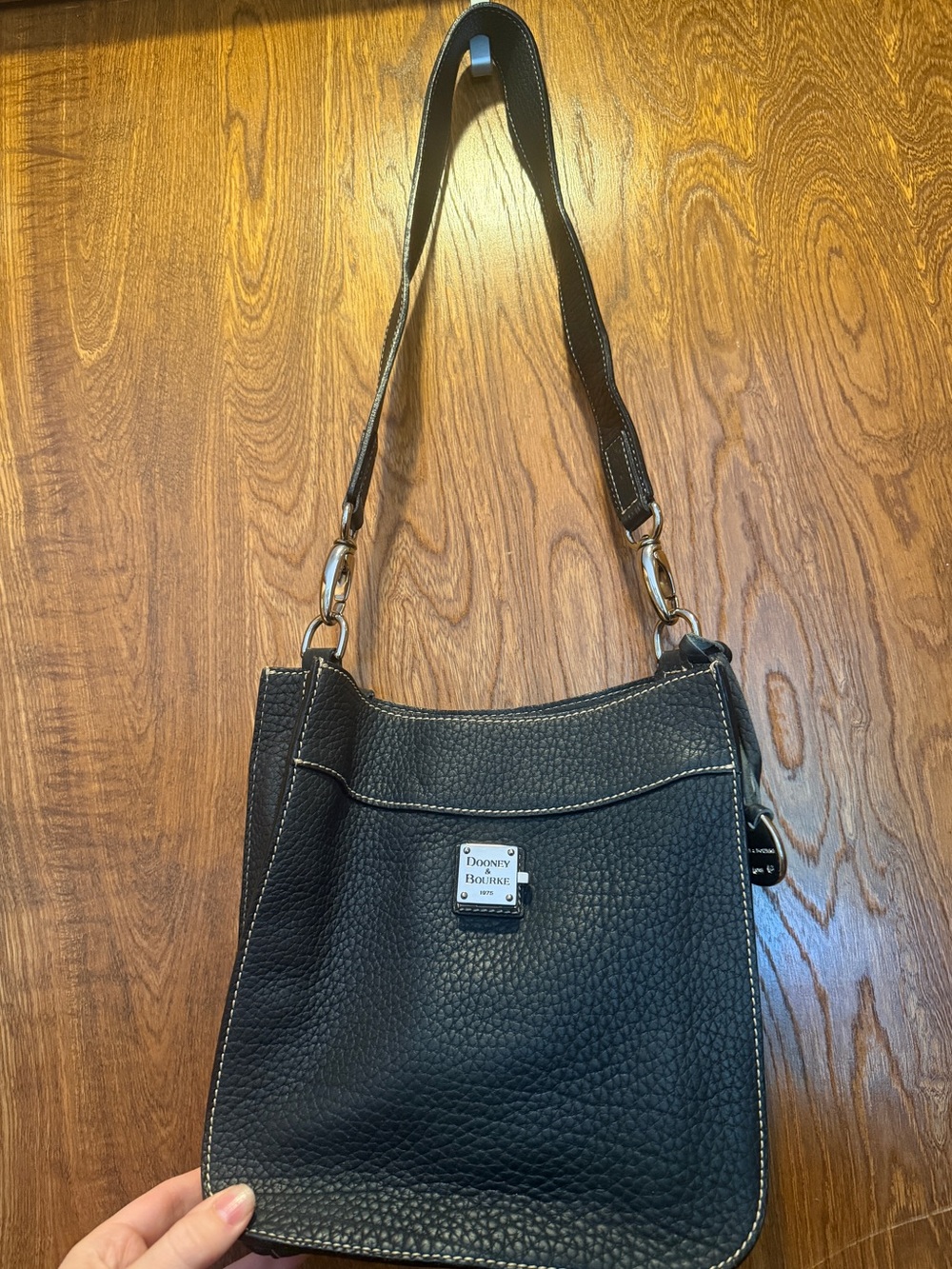 Dooney & Bourke Black Pebble Leather Crossbody Bag with colorful interior